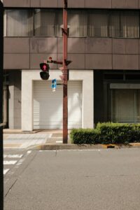 Traffic light and building facade on a sunny day